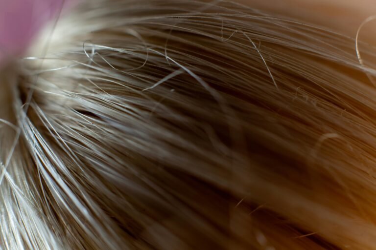 Postpartum Hair Loss: Understanding and Healing Your Strands